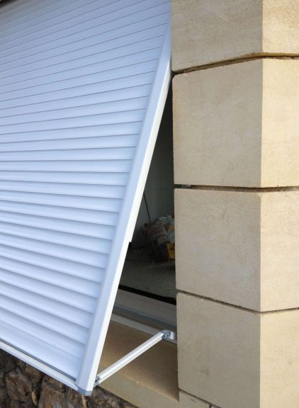 Handmatig uitvalscherm voor gemotoriseerd rolluik